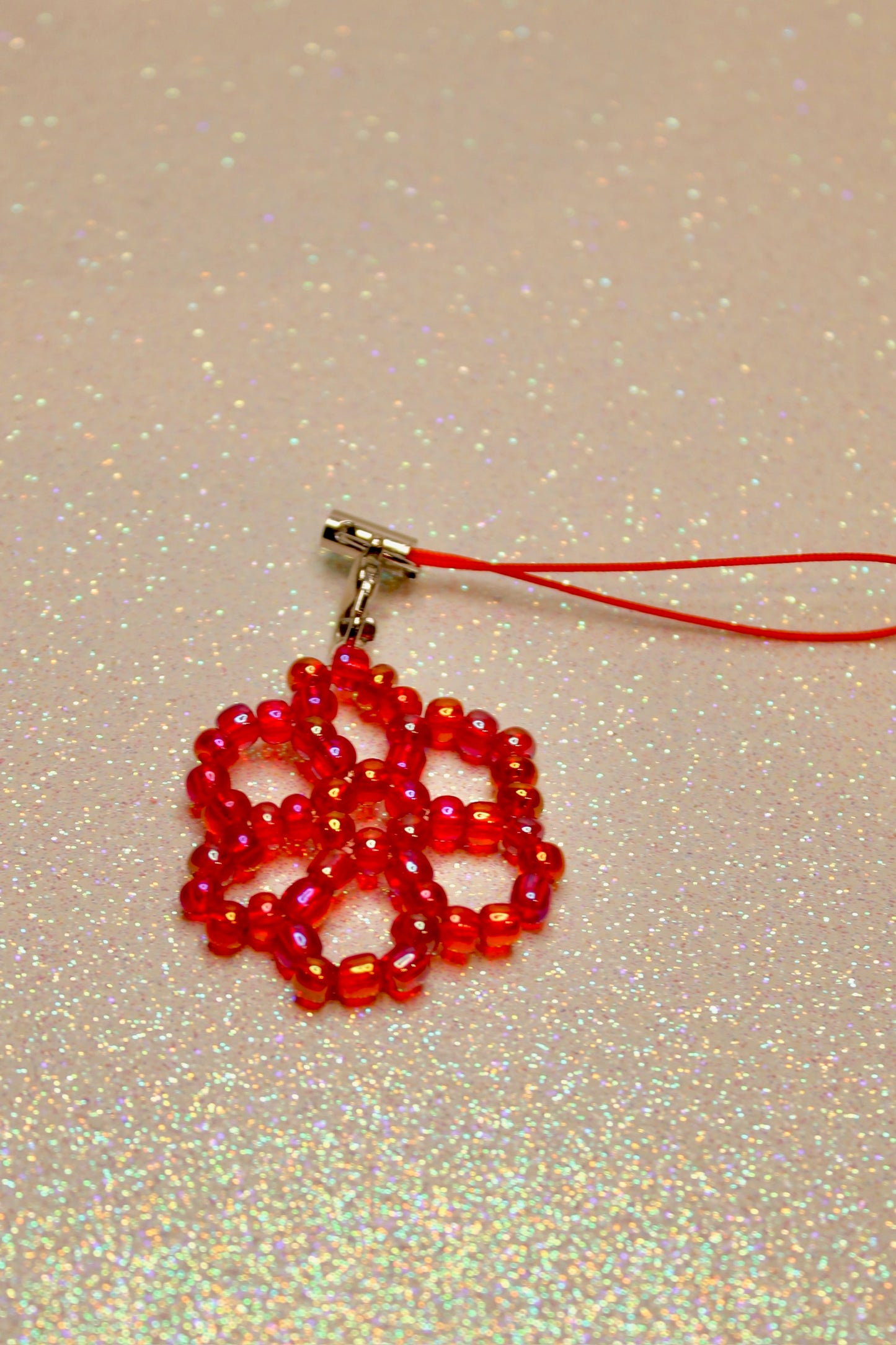 Red flower phone charm